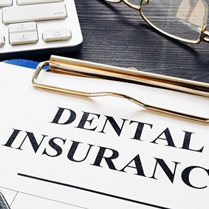 Insurance paperwork for the cost of dental implants in Colorado Springs