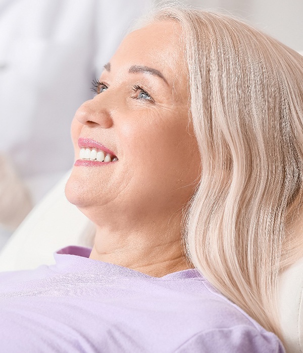 woman smiling in treatment chair 
