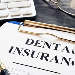 Dental insurance form lying on a table