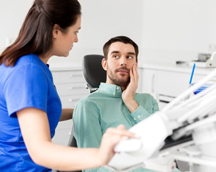 Periodontist discussing dental implants in Colorado Springs with a patient