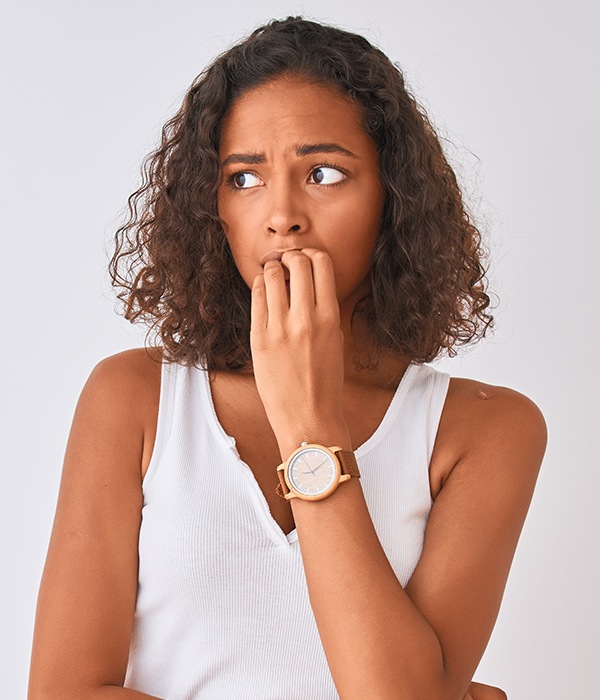 Woman in pain before gum graft procedure