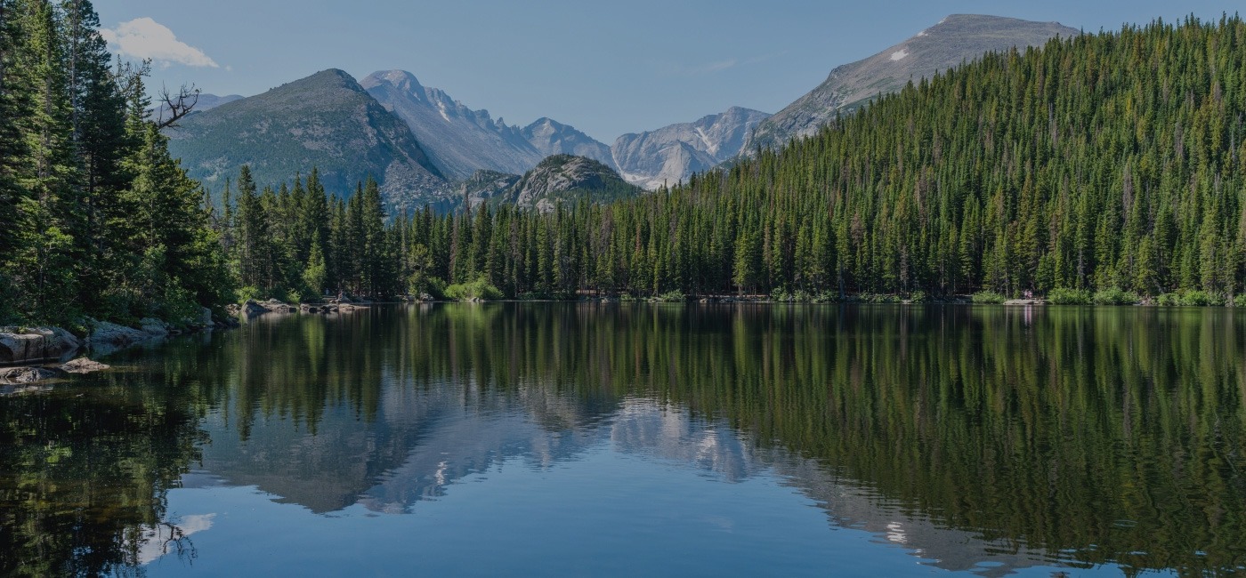 Lake with mountains in background