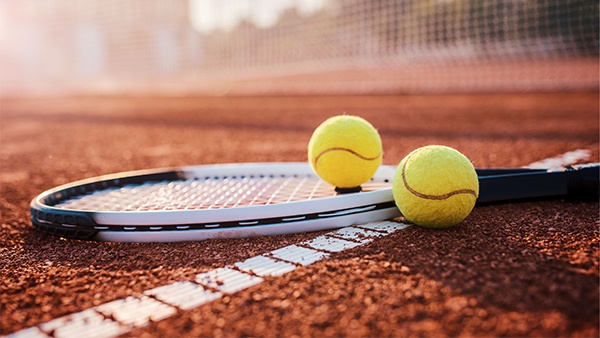 Tennis balls and racquet