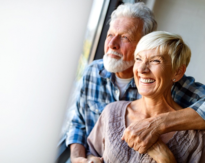 couple smiling after pocket reduction