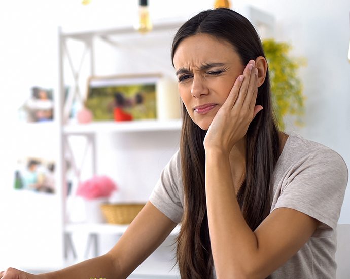 Woman in need of wisdom tooth extractions