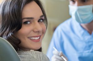 Smiling woman in dental chair