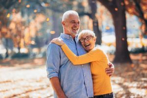 couple walking through park