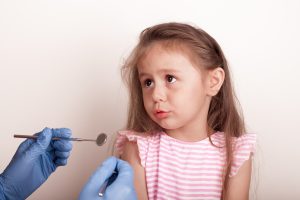 little girl at dentist