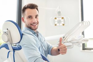 man at a dental checkup to avoid gum disease 