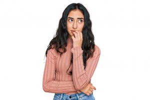 a patient with an anxious facial expression